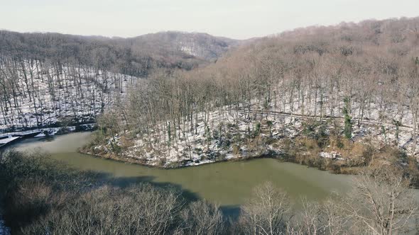 aerial view of woods with snow