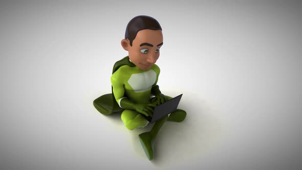 Fun 3D cartoon superhero typing on a laptop