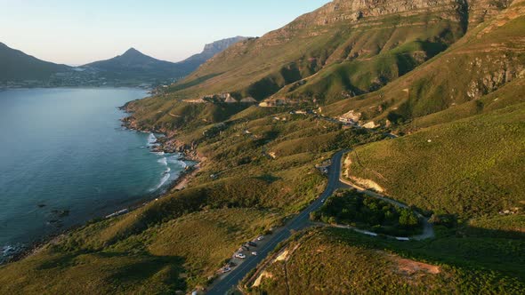 Beautiful coastline of Chapmans Peak road at sunset in Cape Town, aerial