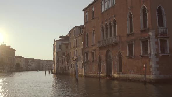 Historic Architecture Facade of building in Canal Grande and Paline, Morning, Venice, Italy