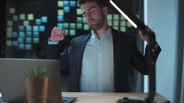 Young Businessman Works Late Oerworked Guy at Work a Tired Falls Asleep in the Workplace Night Time