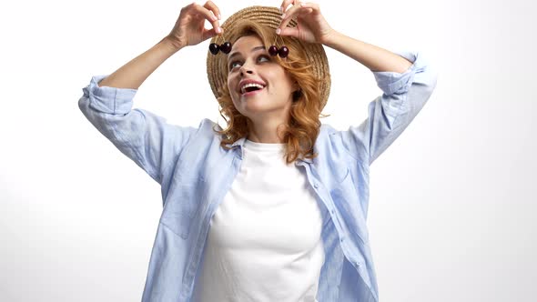 Young Girl in Playful Mood Wear Straw Summer Hat Kissing Fresh Ripe Sweet Cherry Berry Natural Food