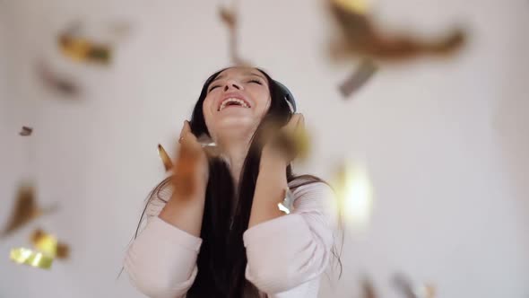 Positive Brunette Woman Listening to Music