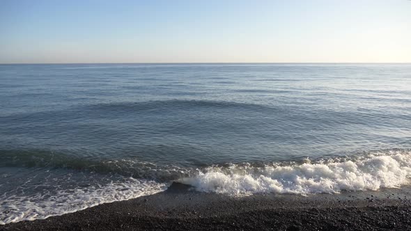 Wave Roll Into Beach