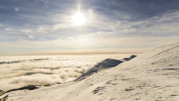 Peaks of Mountains above the Clouds alt