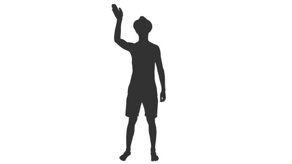 Silhouette of Young Man Stands and Waving Hand Hello