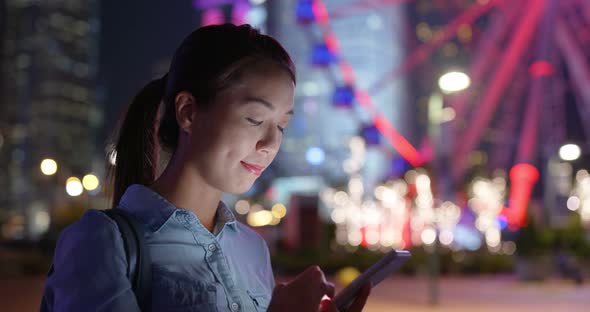 Woman use of smart phone in Hong Kong city