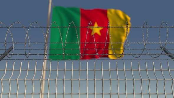 National Flag of Cameroon Behind Barbed Wire