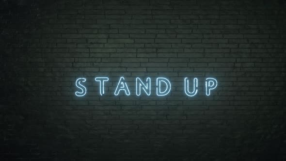 Glowing Stand Up Emblem on Black Brick Wall Background