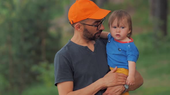 Happy Holidays of Father and Son in Nature.