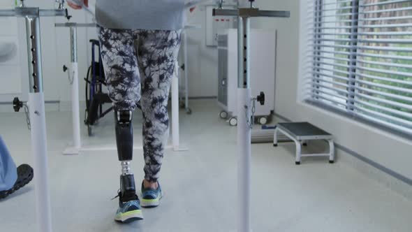 Woman with prosthetic leg at hospital