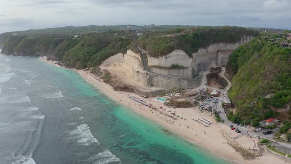 Aerial Footage Tropical Beach and Blue Sea Water with White Waves Drone View