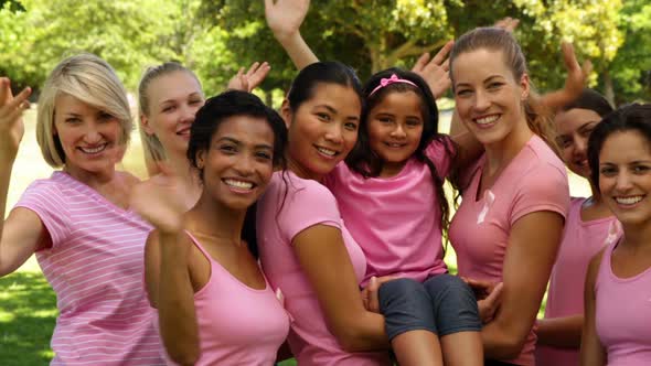 Happy Women in Pink for Breast Cancer Awareness in the Park