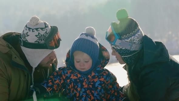 Young Family on Winter Vacation 