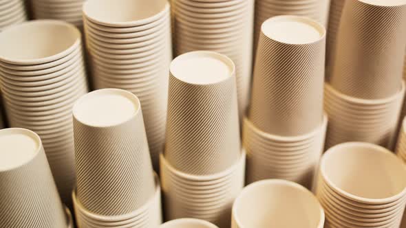 Seamless looping animation of assorted disposable coffee cups. Stacks of cups.