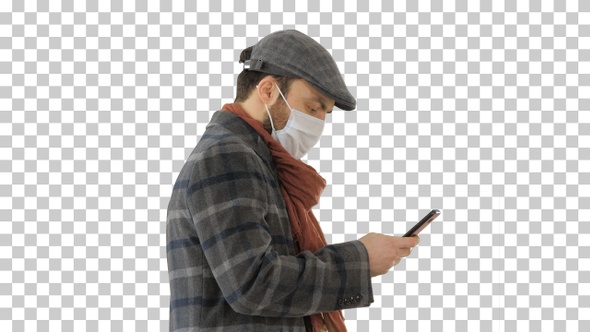 Stylish man in medical mask walking and, Alpha Channel
