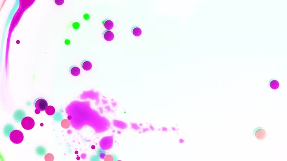 Multicolor Paint Drops in Water alt