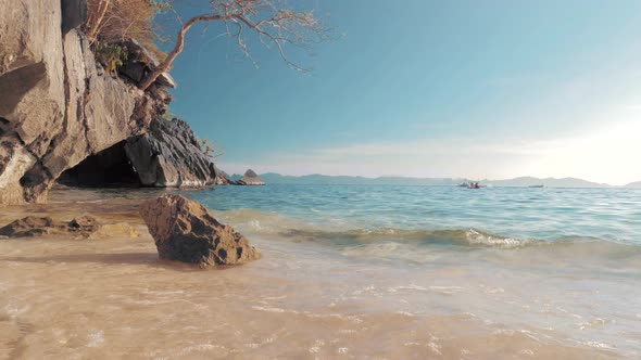 Seascape Ocean and Beautiful Beach, Rocks on Sandy Beach with Blue Sea Waves on Sunny Day, Palawan