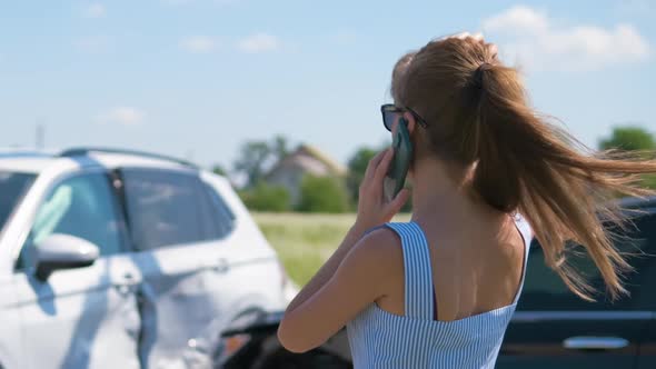 Stressed Woman Driver Talking on Mobile Phone on Street Side Calling for Emergency Service After Car