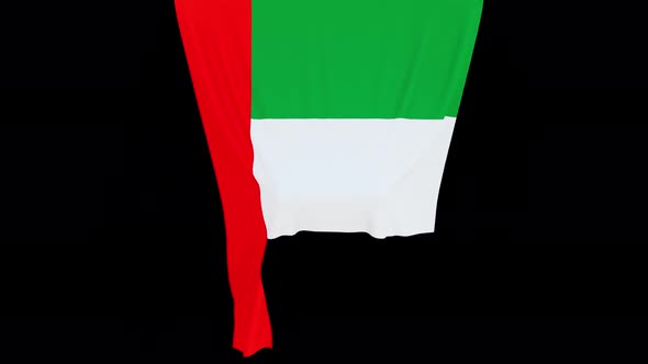 The piece of cloth falls with the flag of the United Arab Emirates to cover the product