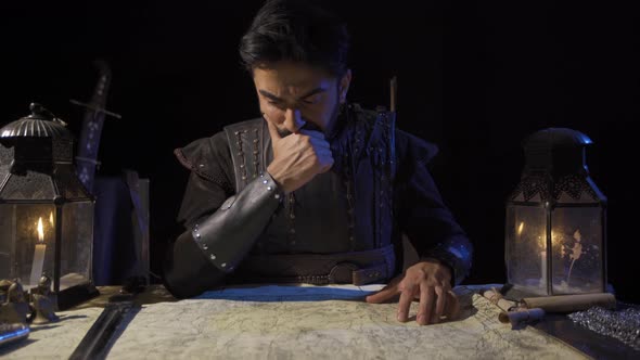 The commander marking the historical map. alt