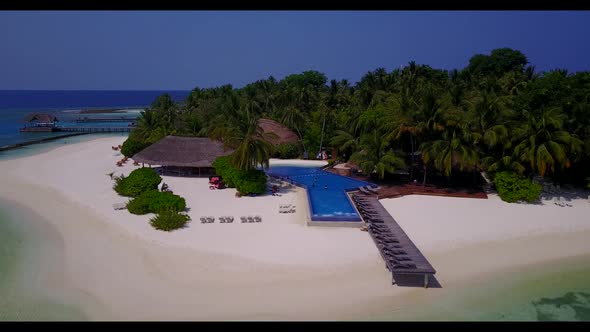 Aerial top down nature of luxury lagoon beach trip by turquoise water with white sand background of 