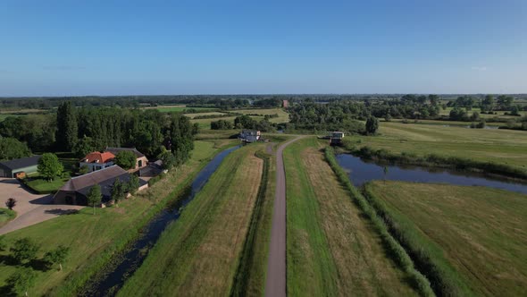 Pumping station part of water management in Dutch river valley landscape at the end of meandering em