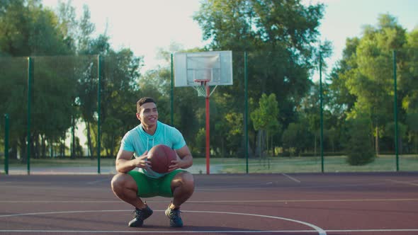 Friends Playing Basketball at Street Playground