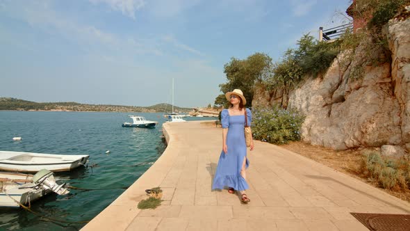 Young traveler on the pier in Sibenik, Croatia