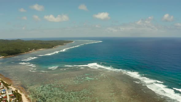 The Coast of Siargao Island, Blue Ocean and Waves