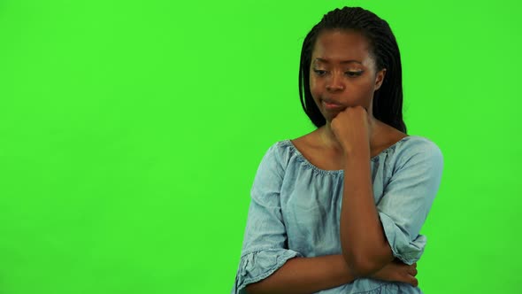 A Young Black Woman Is Bored - Green Screen Studio