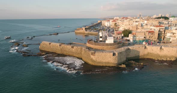 Aerial view of natural water pool along the coast in Acre Old town, Israel.