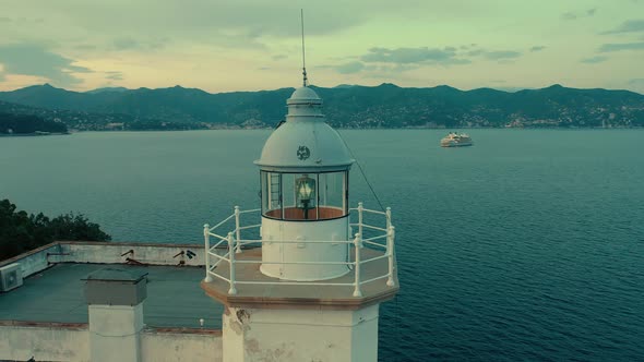 Lighthouse On Rock Above Sea