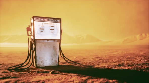 A Vintage Rusted Gas Pump Abandoned in the Desert alt