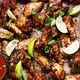 Baked Delicious Homemade Chicken Wings with Fresh Herbs Tomato Dip and Lime - VideoHive Item for Sale
