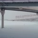 The Drone Flies Along the Cablestayed Bridge in a Snow Storm Highway Blizzard - VideoHive Item for Sale