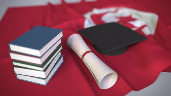 Graduation Cap and Diploma on the Flag of Tunisia alt