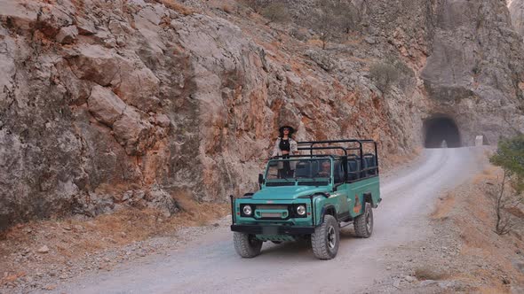 Traveler Woman Doing Offroad Tour On Rocky Road