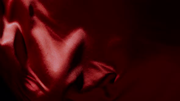 Red Wavy Fabric Background in Super Slow Motion
