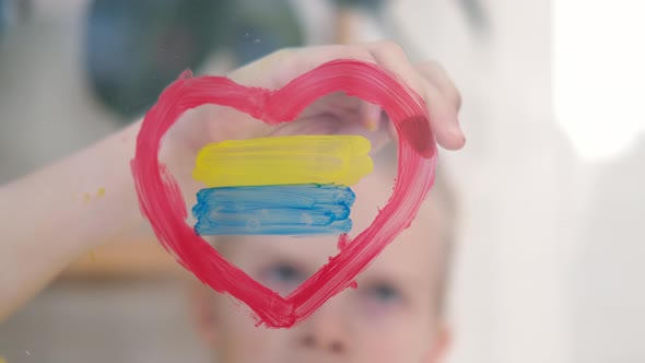 Girl Painting Flag of Ukraine on the Window Upset and Survives the War Ukraine Russia