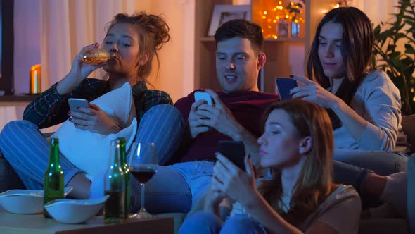 Friends with Smartphone Watching Tv at Home 73