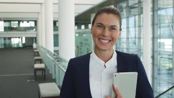 Portrait of businesswoman in modern office building