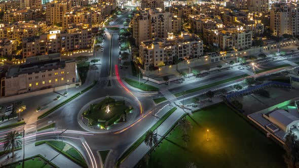 Aerial View of a Roundabout Circle Road in Dubai Downtown From Above Night Timelapse