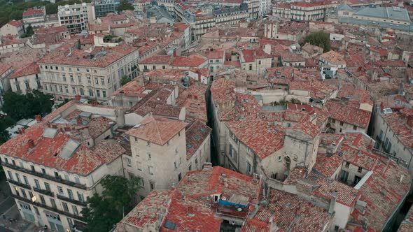 Descending drone shot of Montpellier tilled roof houses