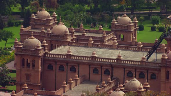 Aerial close up view of a beautiful old heritage building, Beautiful park and trees around the build