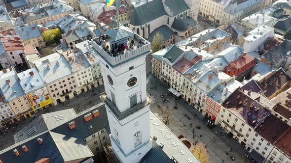 Aerial Drone Video of Lviv Old City Center - Roofs and Streets, City Hall Ratusha