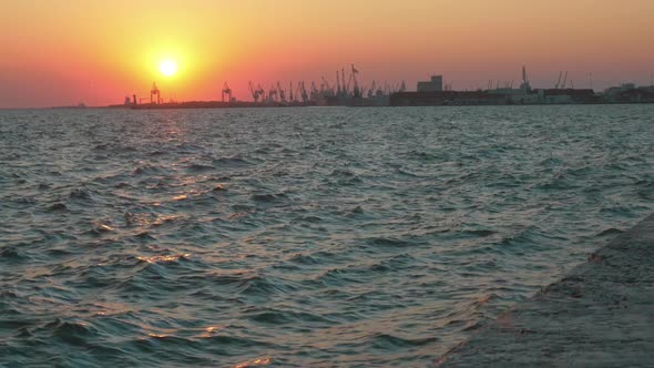 Wavy Sea and Golden Sunset