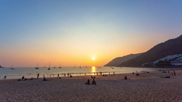 Time Lapse People Relax In Nai Harn Beach At  Sunset