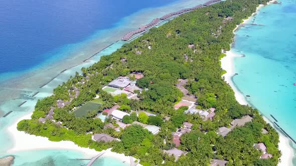 Drone aerial scenery of shore beach time by blue water with sand background