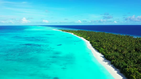 Aerial top view nature of exotic coast beach journey by transparent ocean with white sandy backgroun